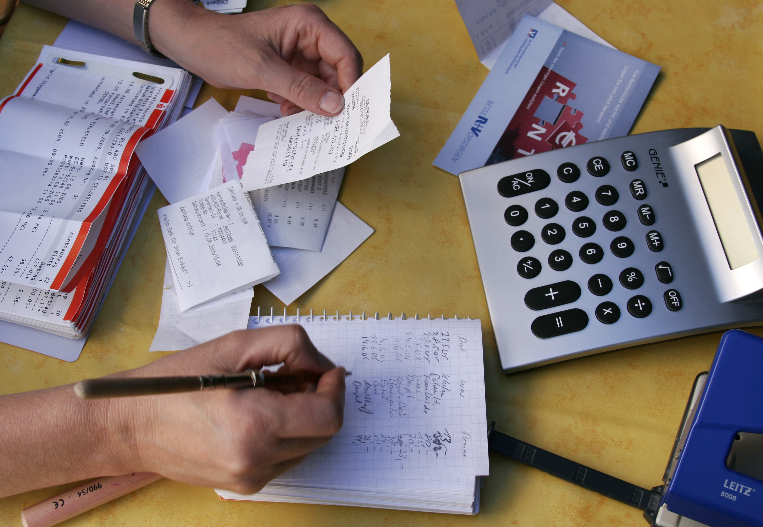 Woman doing accounts / accounting / financial accounts